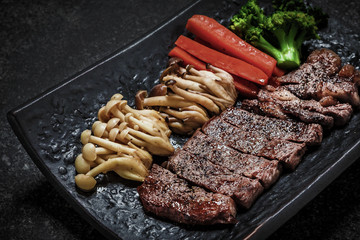 grilled japanese beef steak teriyaki serve  with vegetables
