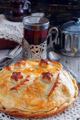Traditional festive Russian pie - Kournik in Russian style, selective focus, the concept of national food © Анна Журавлева