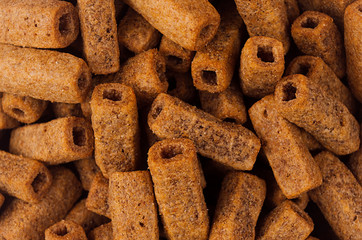 Beer spicy brown snacks as texture, top view.