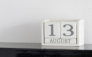 White block calendar present date 13 and month August