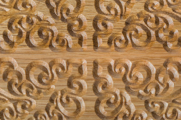 Carved pattern on wood background