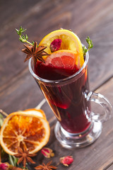 mulled wine on the wooden background