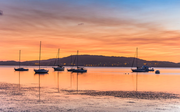 Dawn Waterscape over the Bay with Boats