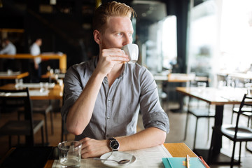 Businessman drinking coffee