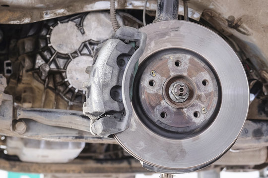 Front suspension of a car