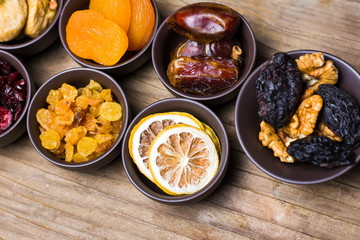 Various dried fruits in small bowls
