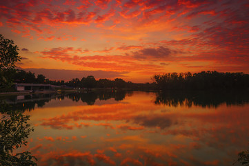 Obraz premium Beautiful Sunset Scenery With Reflection on lakes.