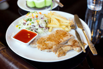 grilled steak with french fries