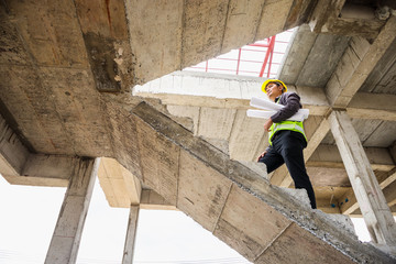 professional engineer worker at the house building construction site