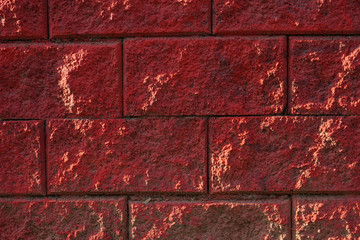 Red stone wall close-up