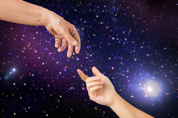 Fototapeta na wymiar close up of senior and young woman hands in space