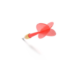 Red throwing dart isolated on white background 