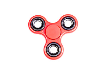 Red fidget spinner isolated on white