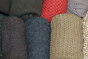top view of open drawer with wool sweaters