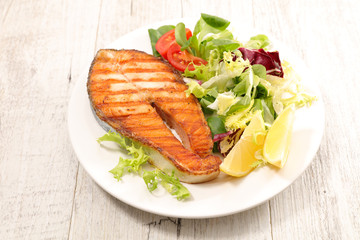 grilled salmon steak and salad