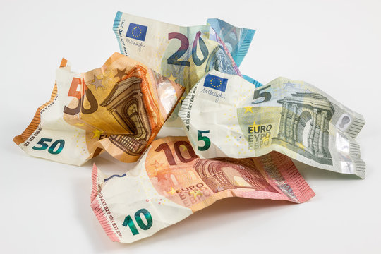 Euro banknotes and white background