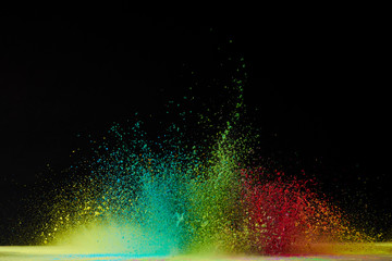 colorful holi powder explosion on black, festival of colours