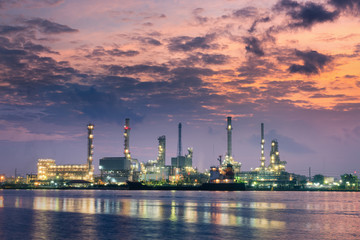 Loading dock and oil refinery plant at sunrise scene