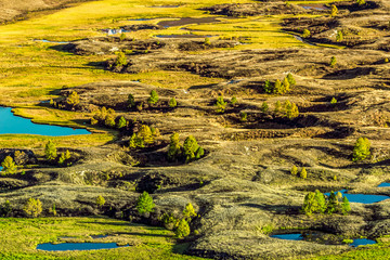 View of the Sunny mountain valley with lakes and rivers. Journey through the Altai Republic.