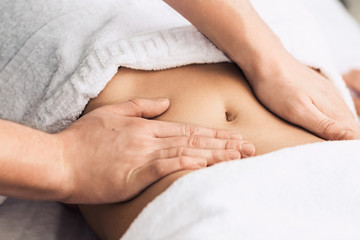 Fototapeta na wymiar Professional massage of the abdomen.