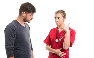 Male patient and female doctor showing calling gesture.