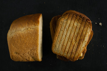 Homemade bread cheese on a stone board