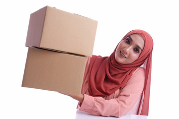 Muslim woman carrying boxes with white background. Delivering conceptual of online business