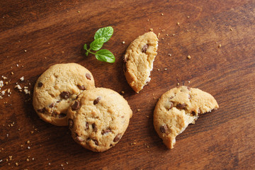 cookies with chocolate on a wooden background