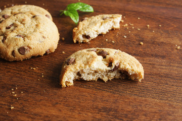 cookies with chocolate on a wooden background
