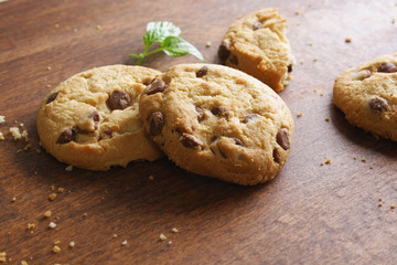 cookies with chocolate on a wooden background