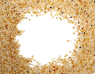 Bird seed pile, millet isolated on white background, top view, frame and border