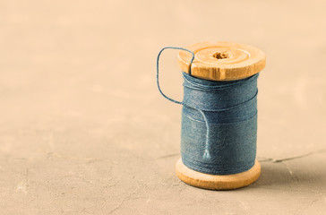 Threads on bobbin retro style. Toned.