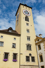 Fototapeta na wymiar Exterior of the historical town hall clock tower in Regensburg, Germany.