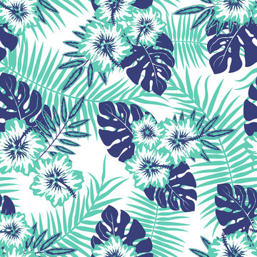 Seamless Vector Pattern of Summery Tropical flowers and leaves ideal for creating wallpapers, fabric patterns, clothing prints, labels, crafts and other projects