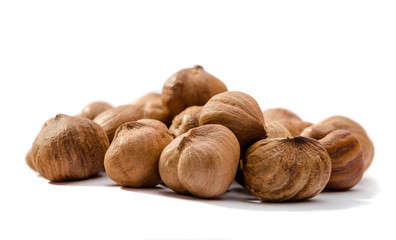 Hazelnuts peeled on white background