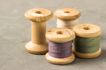 Set of threads on bobbins retro style. Toned.