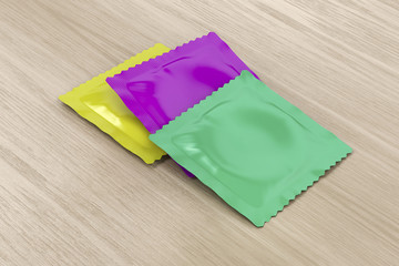 Condoms on wooden table