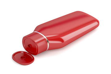 Red plastic shampoo bottle