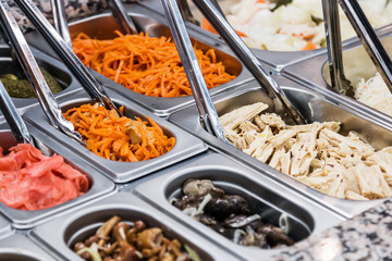 Pickled vegetables on self service restaurant counter or shop counter
