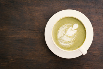 Green tea cup in cafe shop time to relaxing ,hipster tone and soft of focus