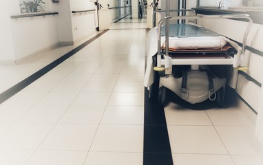 empty bed in the hospital corridor