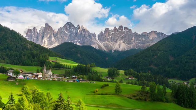 Time Lapse Dolomites Italy landscape at Santa Maddalena or St. Magdalena village at foot of Ruefen Mountain. The beautiful mountain landscape attracts tourist to Dolomites travel in Northern Italy.