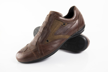 Male brown leather shoe on white background, isolated product, comfortable footwear.