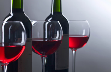 Bottles and glasses of red wine