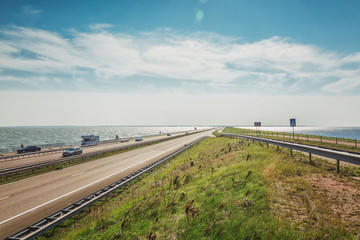 The Afsluitdijk is the thirty-two kilometer long connection between the Dutch provinces of North Holland and Friesland