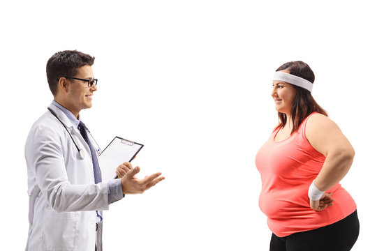 Doctor advising an overweight woman
