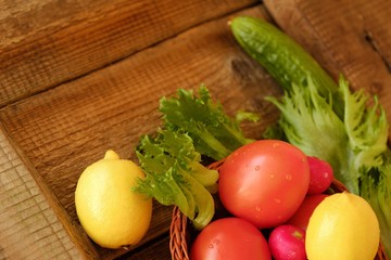 Summer vegetables and fruits on a wooden table 