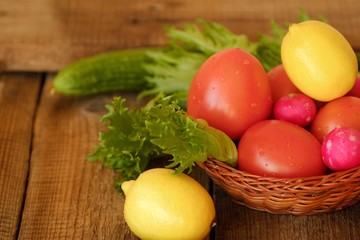 Summer vegetables and fruits on a wooden table 