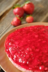 Fresh strawberry pie and berries on the table  