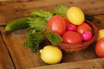 Summer vegetables and fruits on a wooden table 